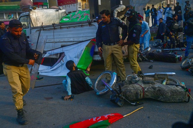 police arrest pti workers AFP